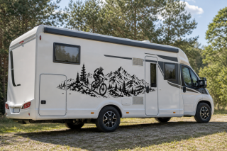 Wohnmobil-Aufkleber Mountainbiker vor Bergpanorama und Tannenwald